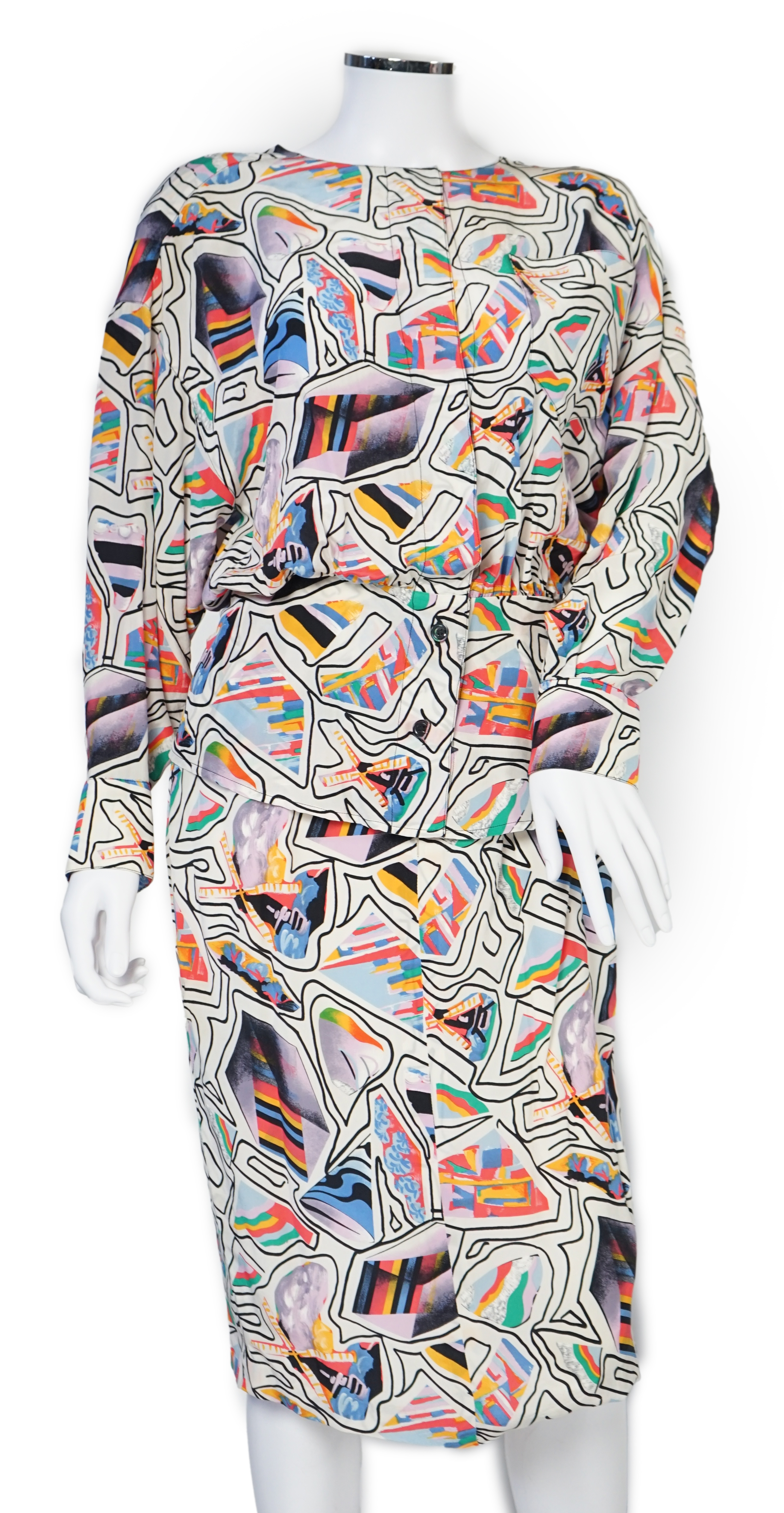 A Karl Lagerfeld lady's multi colour silk suit and a pair of velvet trousers, both size 38